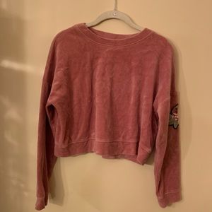 Velour pullover with embroidered rose